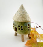 Little Spirit Stilt House 01. Speckled olive variant.