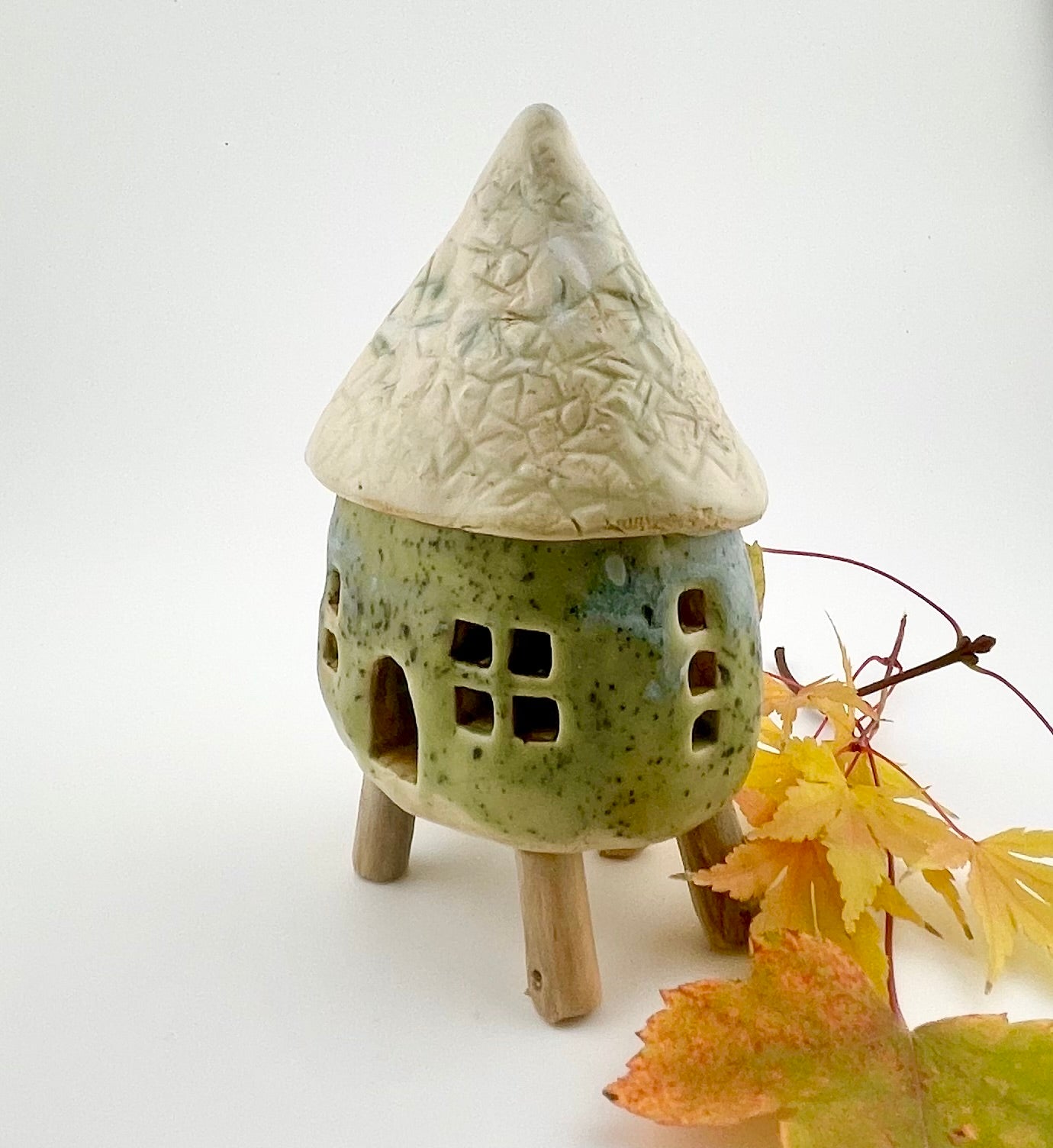 Little Spirit Stilt House 01. Speckled olive variant.