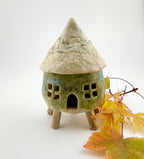 Little Spirit Stilt House 01. Speckled olive variant.