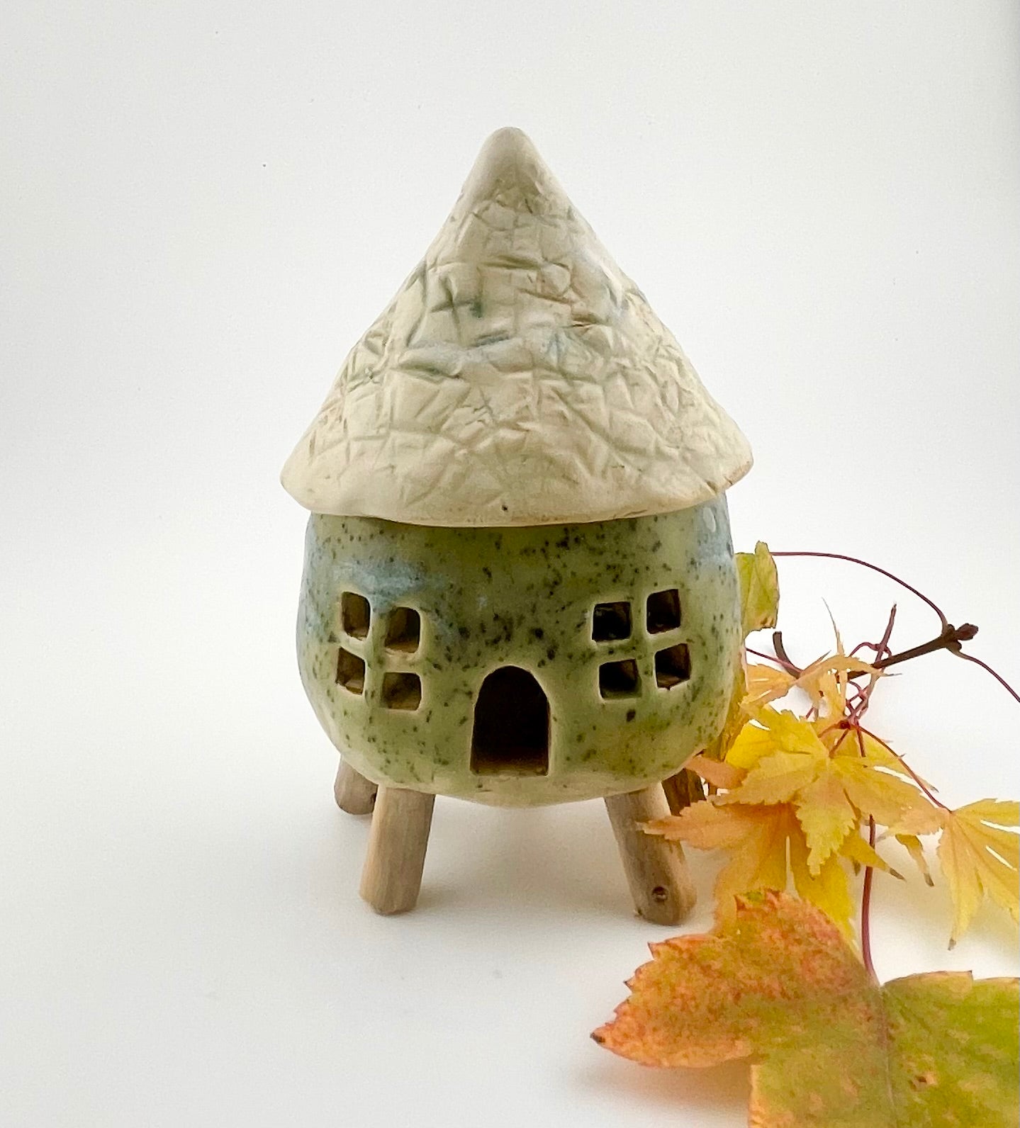 Little Spirit Stilt House 01. Speckled olive variant.