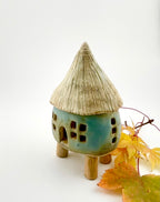 Little Spirit Stilt House 01. Satin greenish variant.