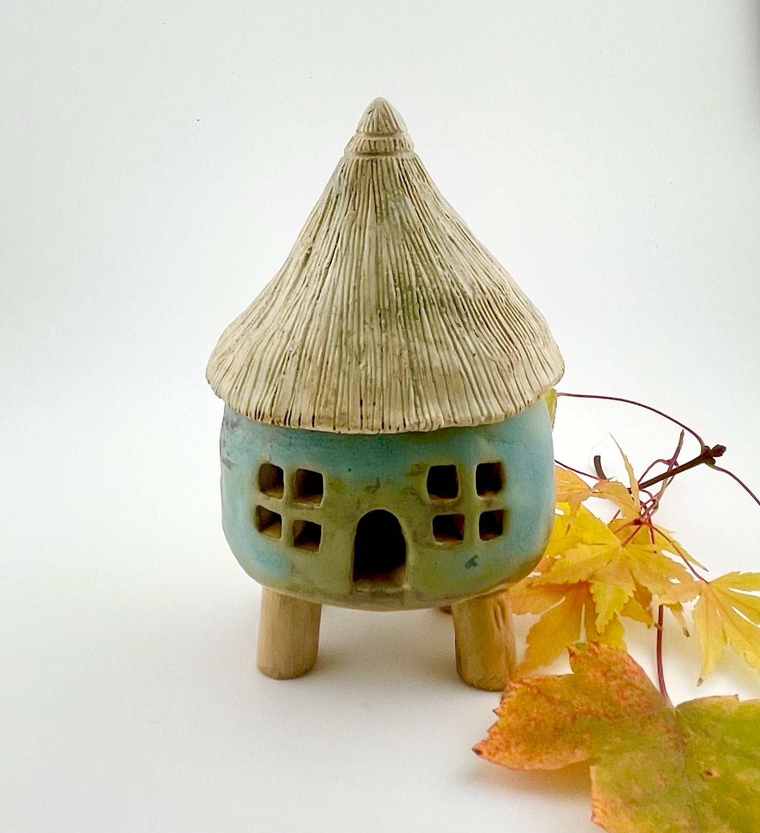 Little Spirit Stilt House 01. Satin greenish variant.