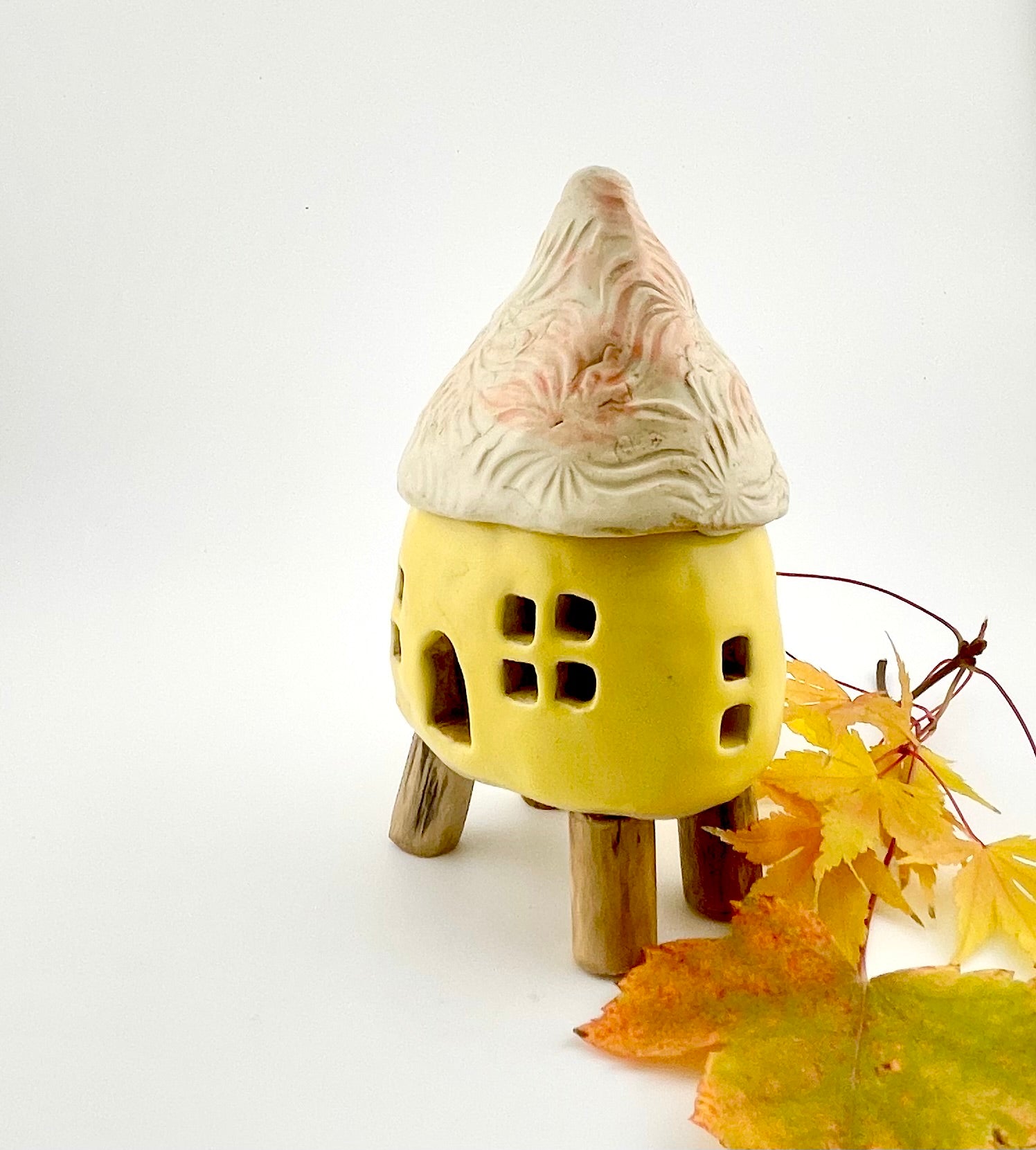 Little Spirit Stilt House 01. Satin yellow variant.