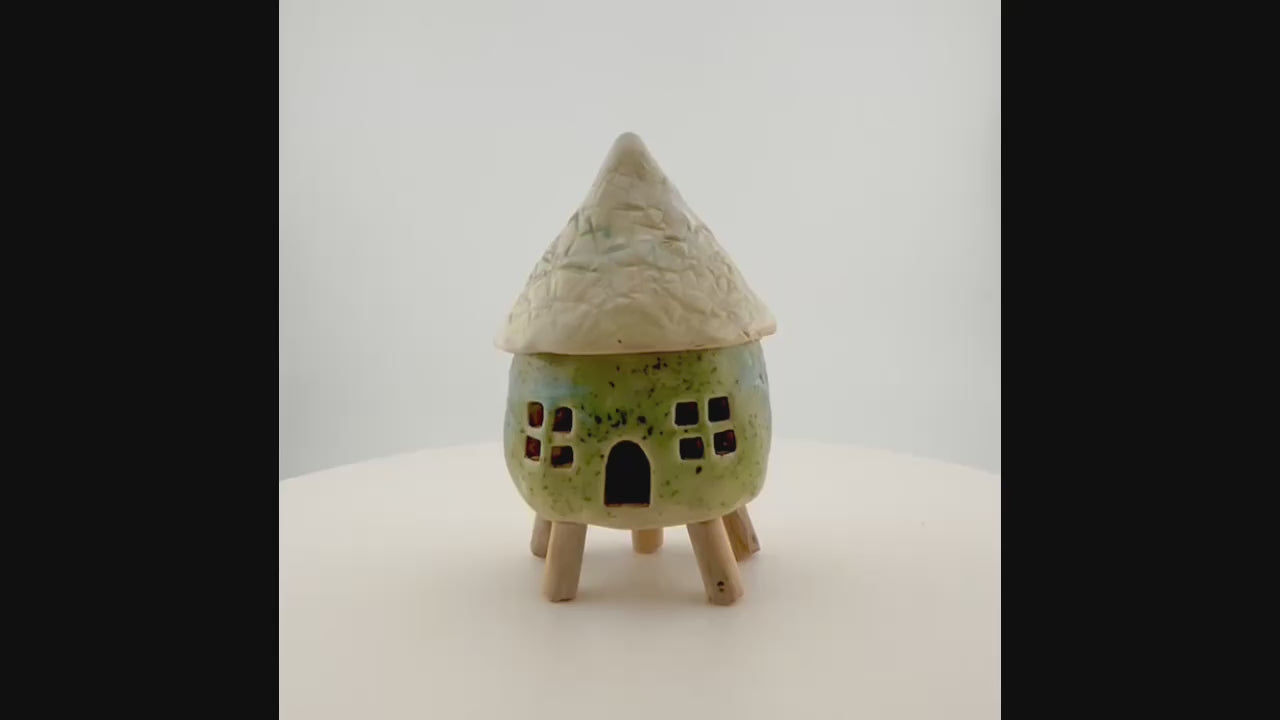 Little Spirit Stilt House 01. Speckled olive variant.