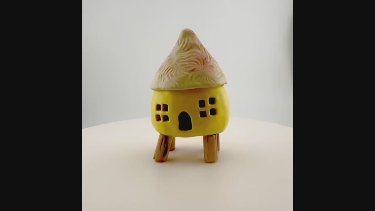Little Spirit Stilt House 01. Satin yellow variant.
